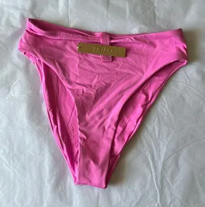 Skims swim bottoms MID WAIST COLOR NEON‎ ORCHID SIZE XS NWT thumbnail 1