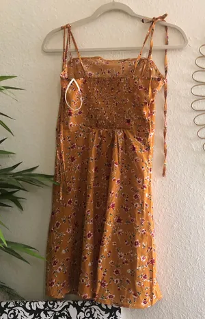 Floral mini dress with adjustable lace up tie knot straps with shirred back detail and invisible side zipper thumbnail 3