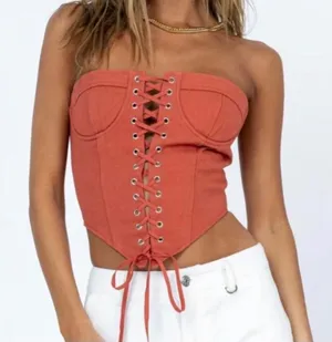 Lioness Russet Lace Up Strapless Corset Top Like New Small. 100% Cotton. No stretch. Like a bra top. Gorgeous item. 14” bust but can adjust wider with laces. 13” long front 7” long back thumbnail 1