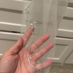 Wedding Veil, perfect condition. Worn for a couple of hours. 34” in length thumbnail 3