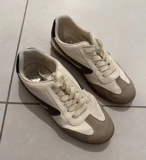 Dolce Vita Men's Cream, Taupe & Black Retro-Style Sneakers thumbnail 1