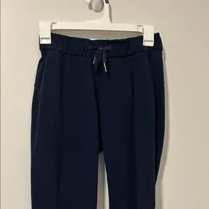 Lululemon Navy Blue On The Fly Jogger Pants Travel Athletic Hiking Size 2 thumbnail 1