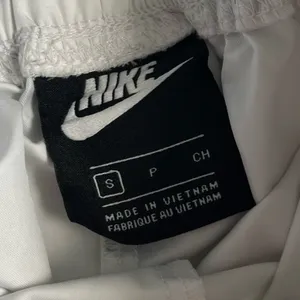 Nike • White Women's Swoosh Woven Sport Shorts thumbnail 11
