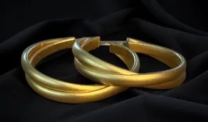 Brushed gold tone intertwined hoop earrings thumbnail 1