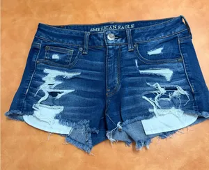 American Eagle Outfitters Ripped Blue Jean Shortie Shorts thumbnail 1