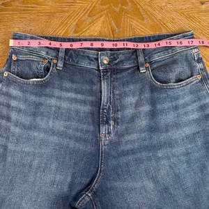American Eagle Super High-Rise Baggy Wide Leg Jeans 14 Short Blue Raw Hem thumbnail 8