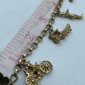 Vintage 6” charm bracelet. Gold tone with crossover clasp. thumbnail 8