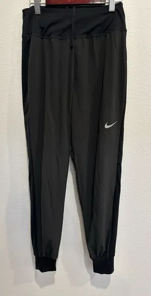 Nike black dri fit pants with cuff. Size womens xs thumbnail 1