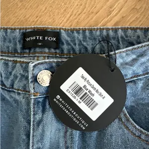 White Fox Boutique - Take My Picture Denim Maxi Skirt in Blue thumbnail 2