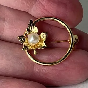 Vintage pearl adorned maple leaf open circle brooch. Gold thumbnail 2