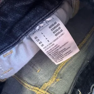 American Eagle distressed Curvy Super High Rise Jeggings‎ dark wash size 4 thumbnail 7