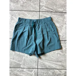 Halara NWOT Womens Teal Blue Active Pleated Shorts Elastic Waist Pockets Size S thumbnail 3