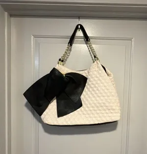 Betsey Johnson Quilted White and Black Bow Shoulder Bag thumbnail 1