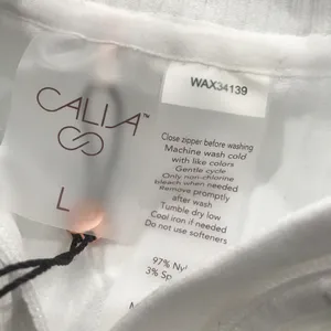 Calia Women's Relaxed Seamless 1/4 Zip in Pure White size L thumbnail 4