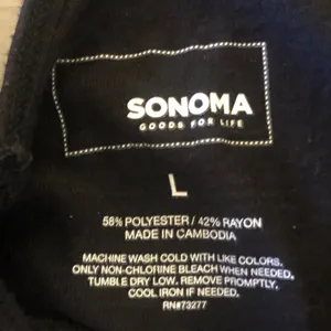Sonoma black V-neck top. Large thumbnail 2