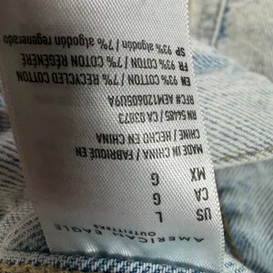 American Eagle Women's Large Light Wash Distressed Denim Jacket Button Front thumbnail 7