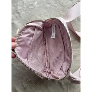 Lululemon Crossbody Belt Bag In Light Pink With Adjustable Strap & Zipper Closur thumbnail 11