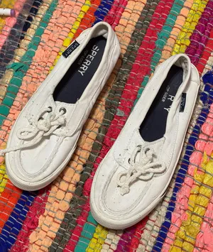 7.5 white Sperry Lounge Away 2 slip-on sneakers featuring decorative knotted barrel laces. thumbnail 1