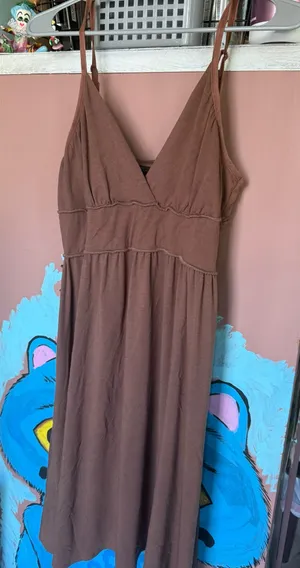 sleeveless brown dress with a V-neckline thumbnail 1