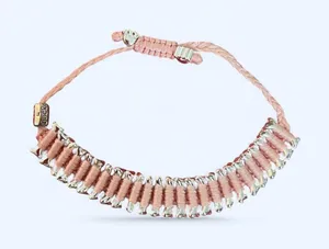 Heart You Back pink dog bone bracelet with silver bones and paws thumbnail 1
