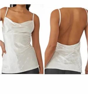 Intimately Free People Velvet All Night Tunic in Champagne NWT Small. Stretchy and soft. Completely open back. Adjustable straps. 14.5-15.5” bust 26” long approximately thumbnail 2