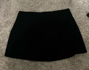 Aeropostale simple black skirt with tiny slit at the bottom thumbnail 1
