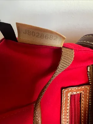 Dooney & Bourke Orange Pebble Leather Tote with Contrasted Straps & added tie thumbnail 6