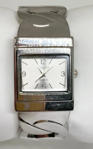Studio silver tone women’s watch 24mm quartz cuff bracelet size 6.5” running thumbnail 1