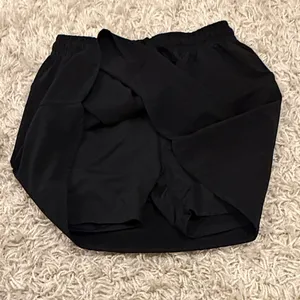 Beyond yoga black tennis skirt with shorts thumbnail 3
