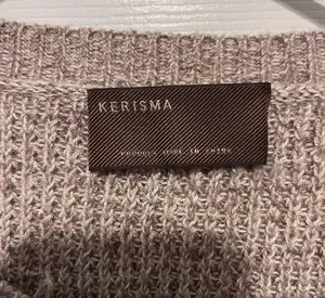 Kerisma beige sweater with black stripe has some angora and wool size s/m thumbnail 2