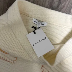 Anthropologie Jacquie The label rib knit mini skirt with pink stitching thumbnail 5