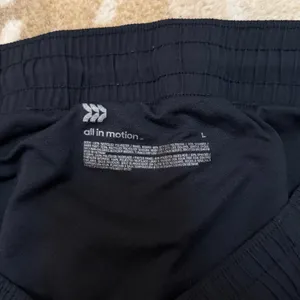 Target All in Motion black reflective athletic shorts women’s size large thumbnail 6