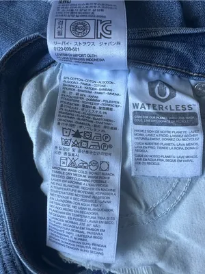 Levi’s medium-wash, high-waisted distressed straight-leg jeans thumbnail 2