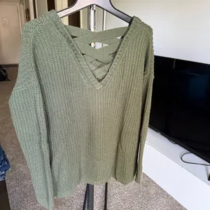 Women's V-Neckline and distinctive criss cross top thumbnail 2