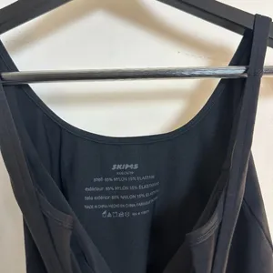 SKIMS Soft Smoothing Seamless Thong Bodysuit in Onyx Black Size X-Small thumbnail 3