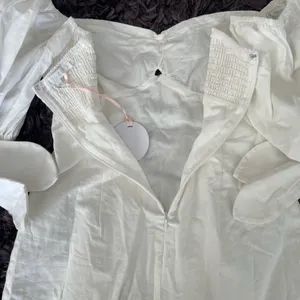 Revolve MORE TO COME Amora Bow Mini Dress in White thumbnail 7