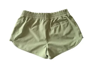 VOLCOM-simply solid board shorts-women’s size small Grass green, elastic smocked waist, Velcro closure back pocket, volcom stone rubber patch, 50+ uber protection, like new confition Measurements: Waist: side to side 14-17 inches Rise: 10 inches thumbnail 1
