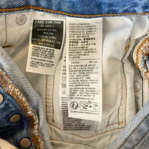Levi's 501 Original Distressed Cut Off Denim Shorts Womens 27 Light Wash Blue thumbnail 8