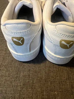 Puma Women's White Low-Top Leather Sneakers with Subtle Gold Logo thumbnail 3