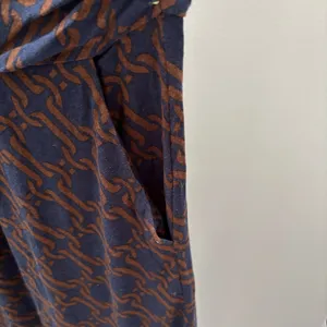 Boden Amelie Navy and Brown Geometric Print Long Sleeve Jersey Dress with Pockets thumbnail 6
