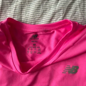 Women’s New Balance Neon Pink Activewear Shirt thumbnail 3