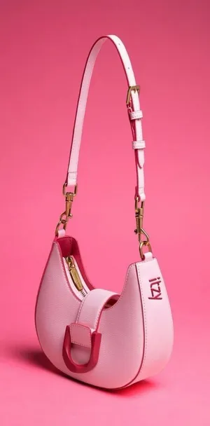 CHARLES & KEITH’s Limited-edition collaboration ITZY Gabine hobo saddle bag. thumbnail 1