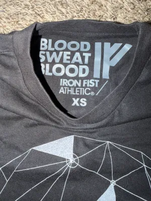 Iron Fist Black short‑sleeve tee featuring a large geometric skull graphic in silver. Modern, edgy design. Great for alternative and streetwear looks. thumbnail 3