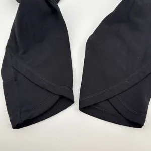 Athleta Salutation Stash Wrap Tight Black High Rise Yoga Leggings Pockets‎ Large thumbnail 5