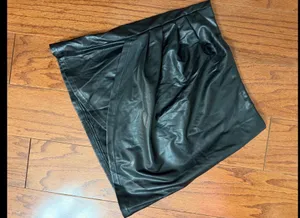 SHEIN Black faux leather skirt - size Small ***Refer to measurements. Beautiful skirt to wear out on a party trip. Fun & spunky. black faux leather mini skirt features prominent side ruching and an asymmetric hem Measurements approximately 15” waste x 15” long. Non- smoking home. priced to sell at as is condition. Don’t like my price, make reasonable offer! And thank you for checking my closet. thumbnail 3