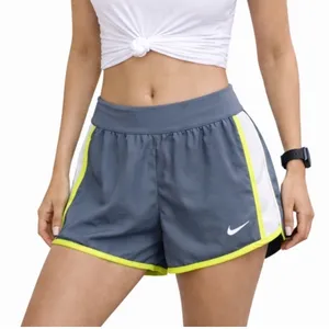 Nike Dri-FIT Tempo Running Shorts Gray‎ White Neon Trim Women’s Size M thumbnail 1