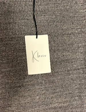 Heather gray marled fringe hem knit dress from the boutique brand Klesis thumbnail 8