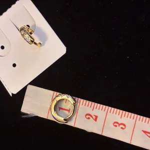 Gold-Tone Starburst Huggie Earrings thumbnail 5