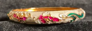 Gold tone enamel bangle bracelet with White, pink and green floral design 7” thumbnail 1