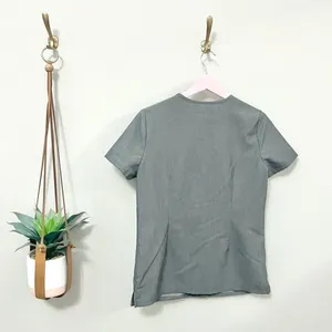 FIGS Clothing Women's Casma Three-Pocket Scrub Top Grey Graphite in Size XS thumbnail 4